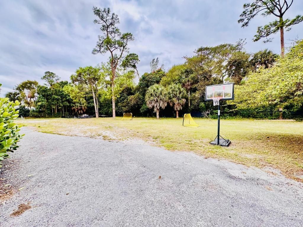 Photo of 214 Westwood Circle E, West Palm Beach, FL 33411 (MLS # R11158646)