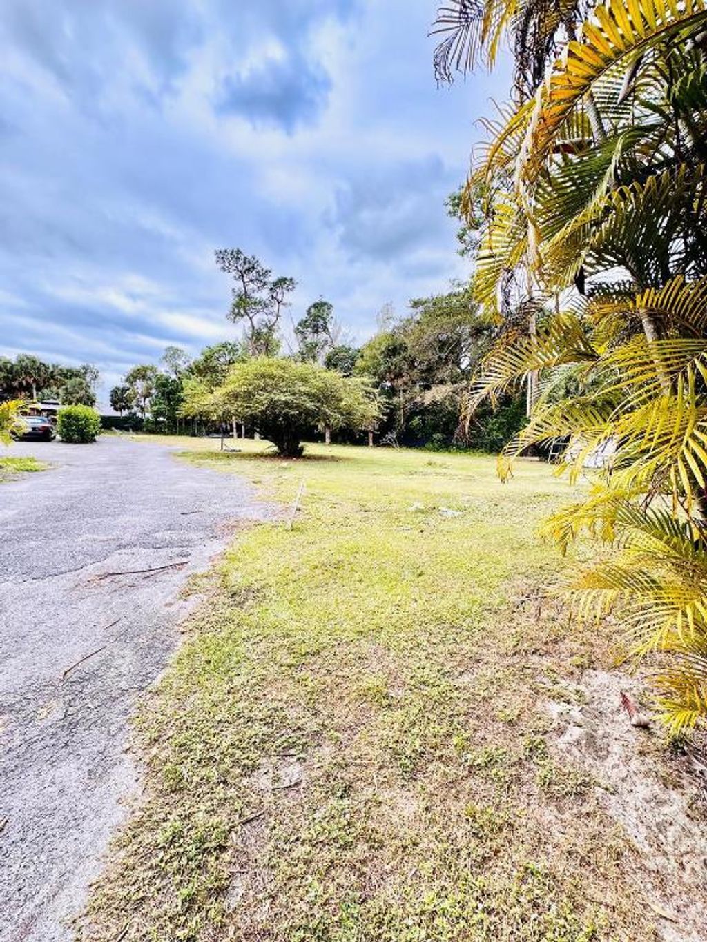 Photo of 214 Westwood Circle E, West Palm Beach, FL 33411 (MLS # R11158646)