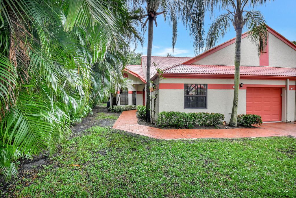 Photo of 7512 Lexington Club Boulevard #A, Delray Beach, FL 33446 (MLS # R11132986)