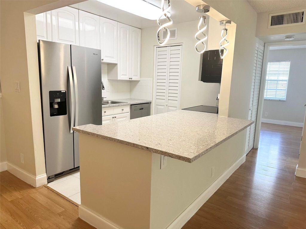 Photo of 12394 Alternate A1a #03, Palm Beach Gardens, FL 33410 (MLS # F10407046)