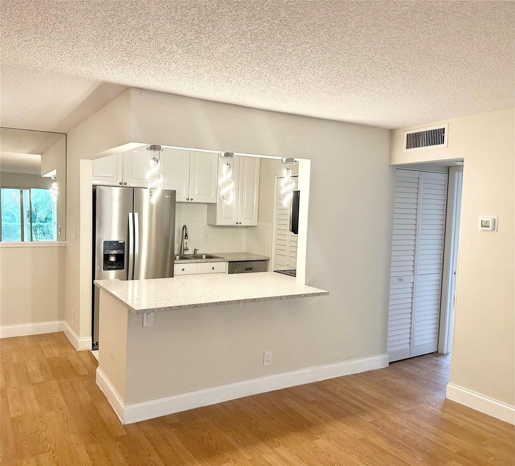 Photo of 12394 Alternate A1a #03, Palm Beach Gardens, FL 33410 (MLS # F10407046)