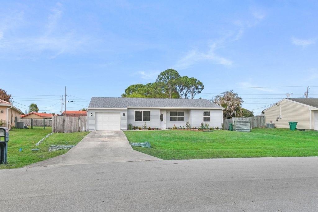 Photo of 1853 SE Dranson Circle, Port Saint Lucie, FL 34952 (MLS # B26020577)