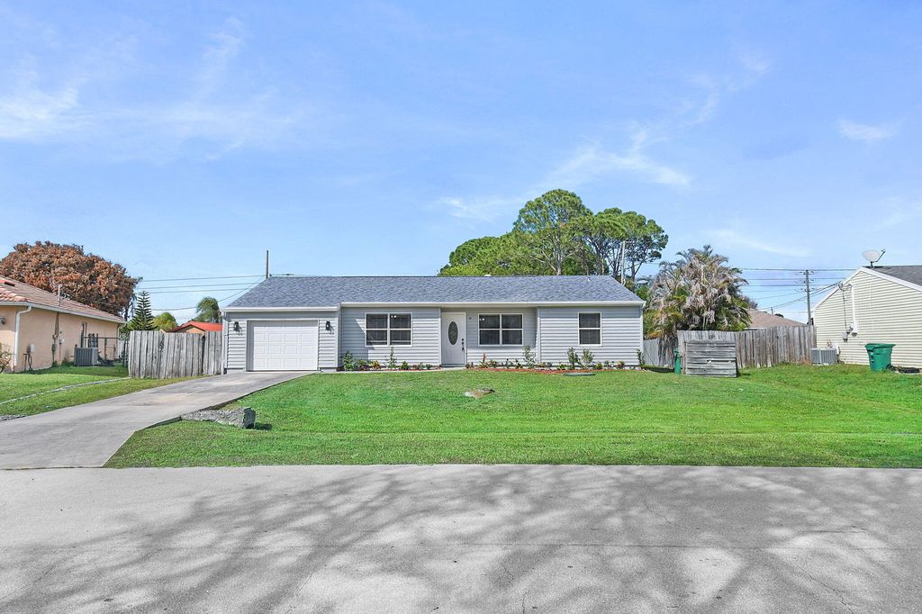 Photo of 1853 SE Dranson Circle, Port Saint Lucie, FL 34952 (MLS # B26020577)
