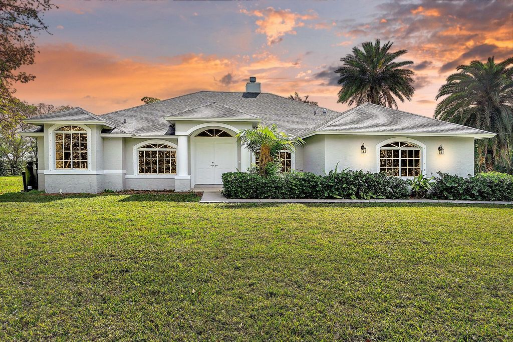 Photo of 15320 N 87th Road N, The Acreage, FL 33470 (MLS # R10959381)