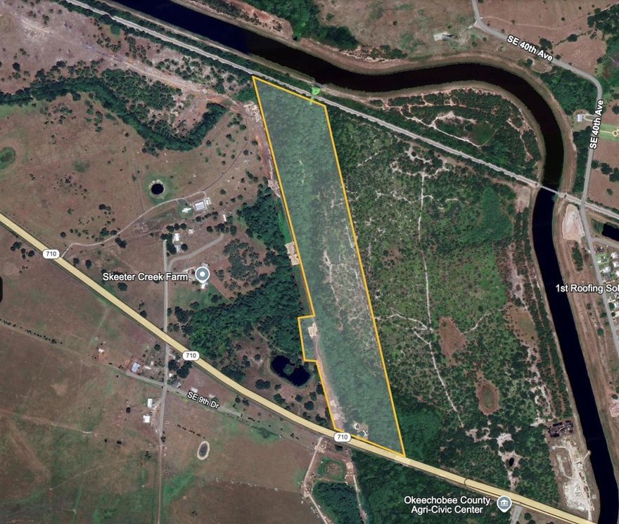 43.93 Acres of land located on State Road 710 and connects to the CSX rail line. Industrial overlay future land use.1800 sq. ft home on property and workshop.
