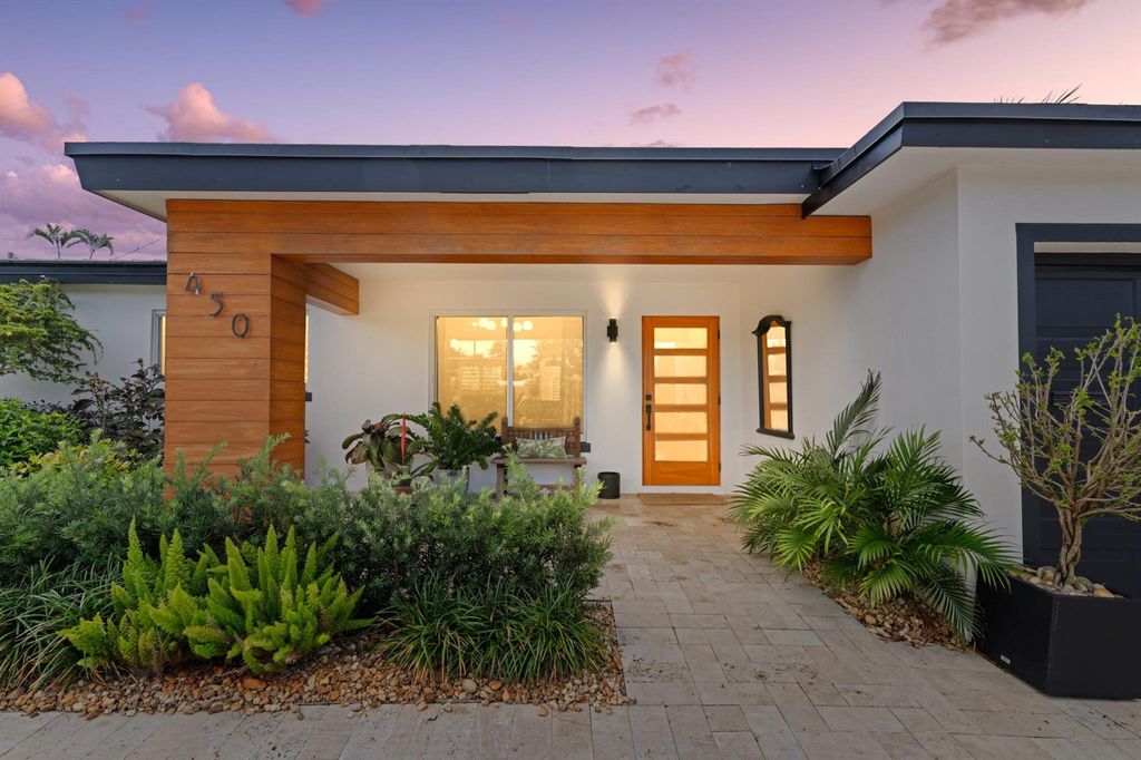 Photo of 450 NE 5th Circle, Boca Raton, FL 33431 (MLS # R11091949)