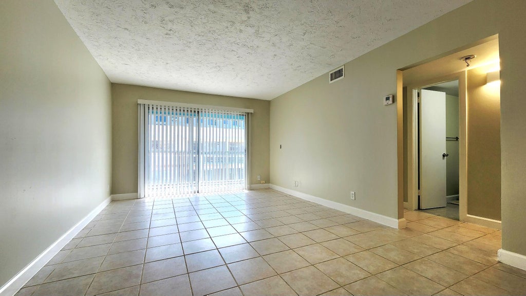 Photo of 1501 CRESCENT Circle #D36, Lake Park, FL 33403 (MLS # B26072173)
