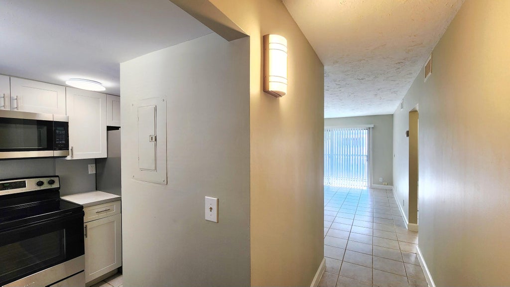 Photo of 1501 CRESCENT Circle #D36, Lake Park, FL 33403 (MLS # B26072173)