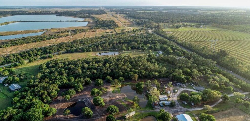 Photo of 11470 Carlton Rd, Port Saint Lucie, FL 34987 (MLS # B26000403)