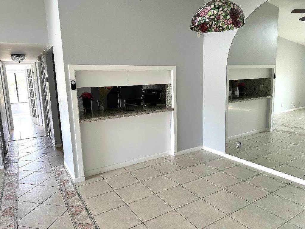 Photo of 728 Sunny Pine Way #A3, Greenacres, FL 33415 (MLS # R11165923)