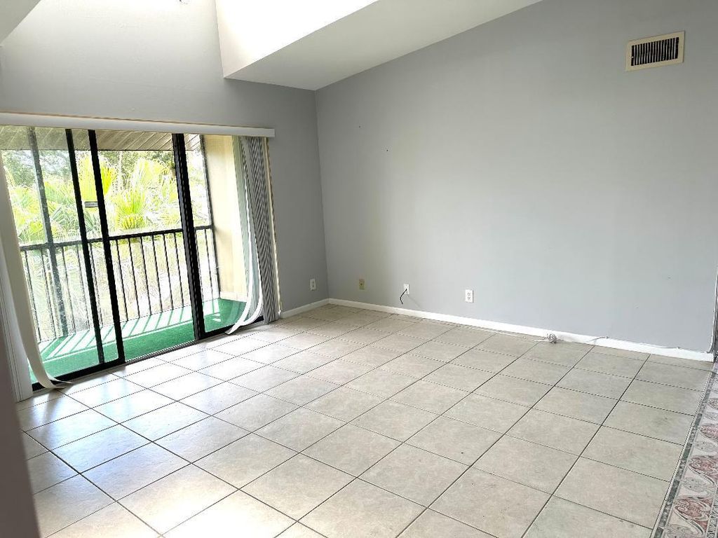 Photo of 728 Sunny Pine Way #A3, Greenacres, FL 33415 (MLS # R11165923)