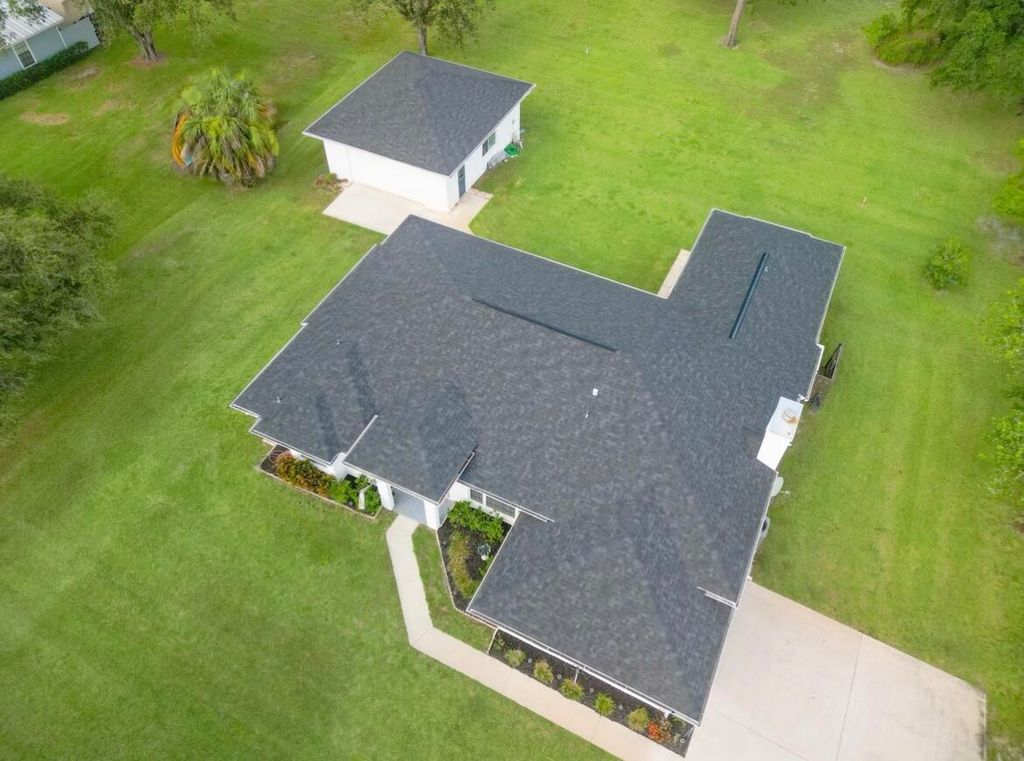 Photo of 110 Woodcrest Drive, Fort Pierce, FL 34945 (MLS # R10974319)