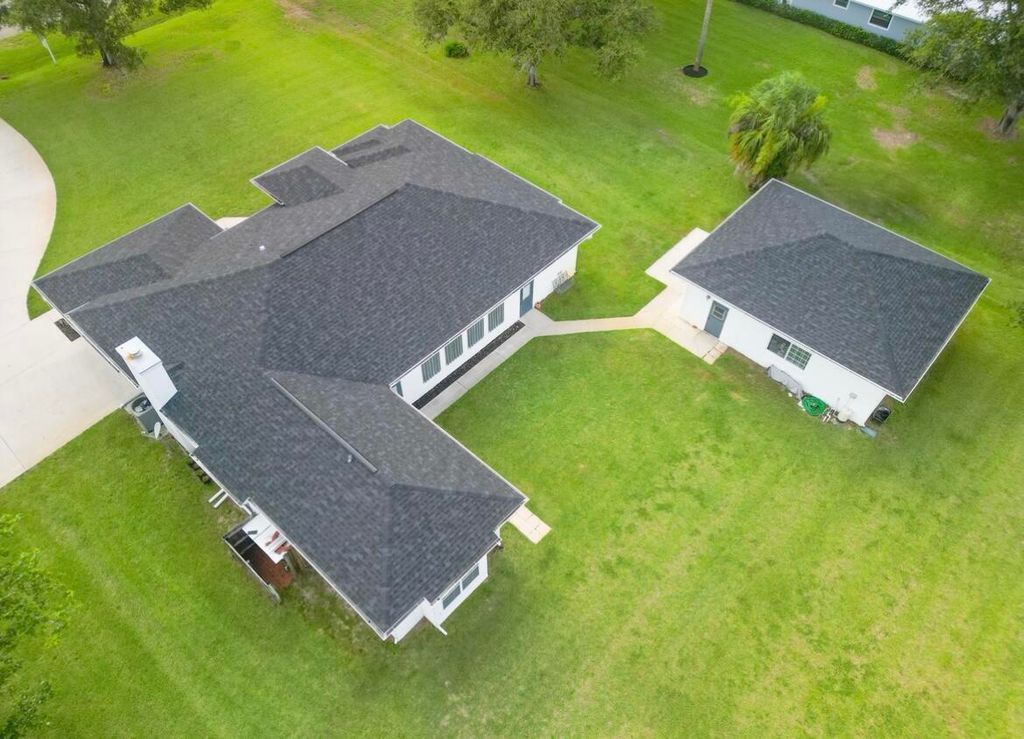 Photo of 110 Woodcrest Drive, Fort Pierce, FL 34945 (MLS # R10974319)