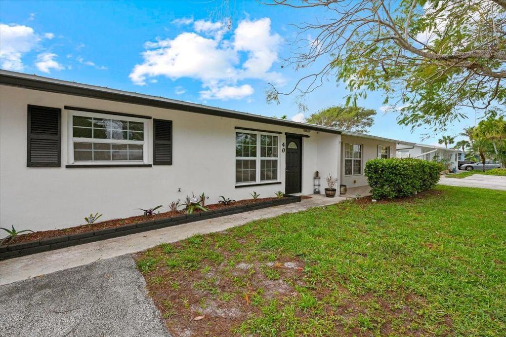 Photo of 40 SW Hideaway Place, Stuart, FL 34994 (MLS # R10928346)