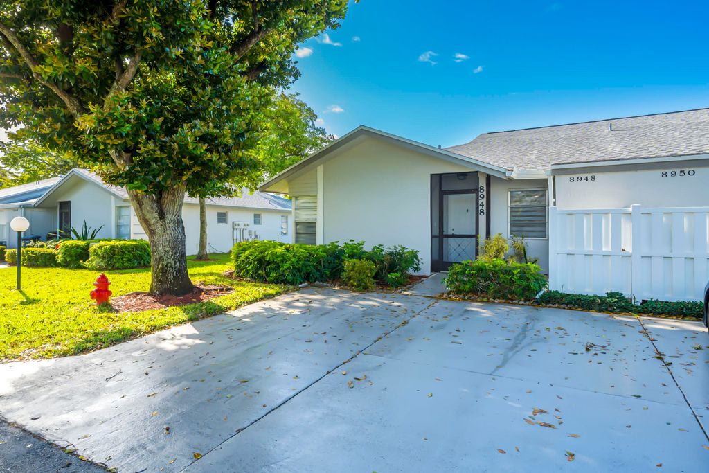 Photo of 8948 Meadowlark Way, Boca Raton, FL 33496 (MLS # B26005916)