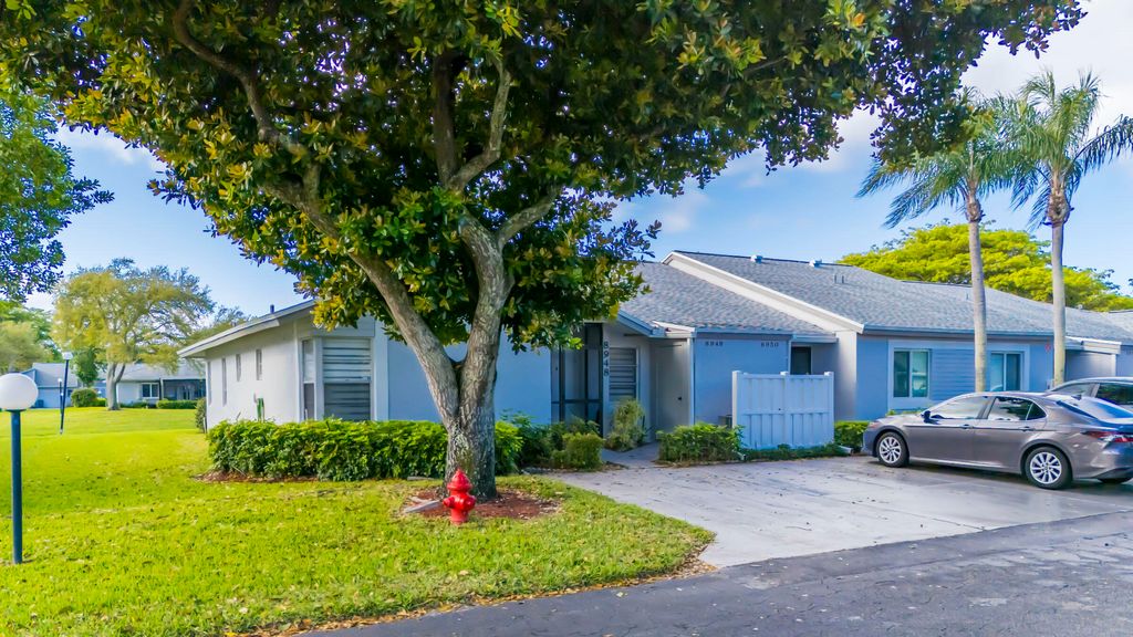 Photo of 8948 Meadowlark Way, Boca Raton, FL 33496 (MLS # B26005916)
