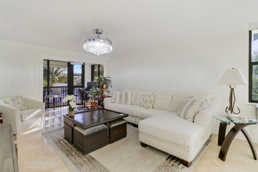 Look no further: Rarely available 3BR/2BA top-floor end unit in the highly sought-after, resort-style community of Bay Colony! Enjoy breathtaking sunsets with marina, Intracoastal & pool views from the fully enclosed balcony. Beautifully remodeled featuring granite countertops, stainless steel appliances, hurricane impact windows, tile flooring & crown molding throughout, a large walk-in closet in the primary & more. Situated on nearly 14 acres with two private marinas, resort-style saltwater pool, spa, fitness center, clubhouse, tennis, pickleball, bocce & lush tropical grounds. A prime location just minutes to Juno Beach, Juno Pier, dining & shopping. True coastal luxury living!