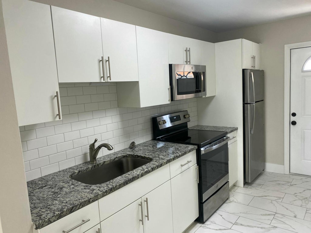 Photo of 920 N J Street #4, Lake Worth Beach, FL 33460 (MLS # R11014519)
