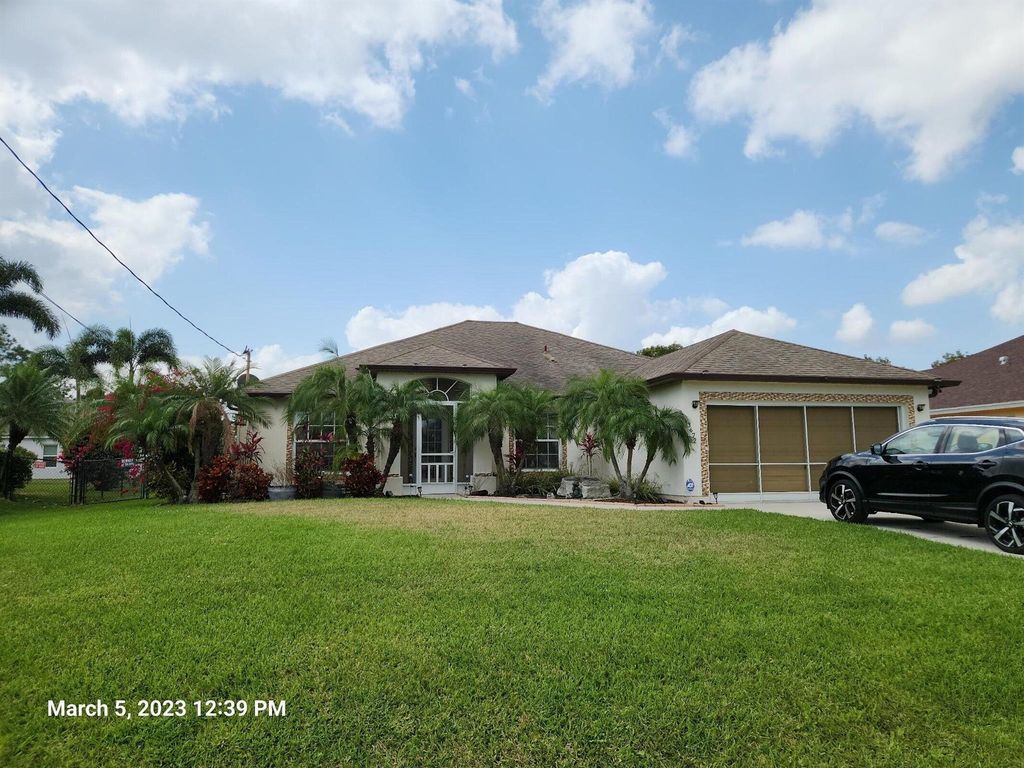 Photo of 3672 SW Carmody Street, Port Saint Lucie, FL 34953 (MLS # R11077400)