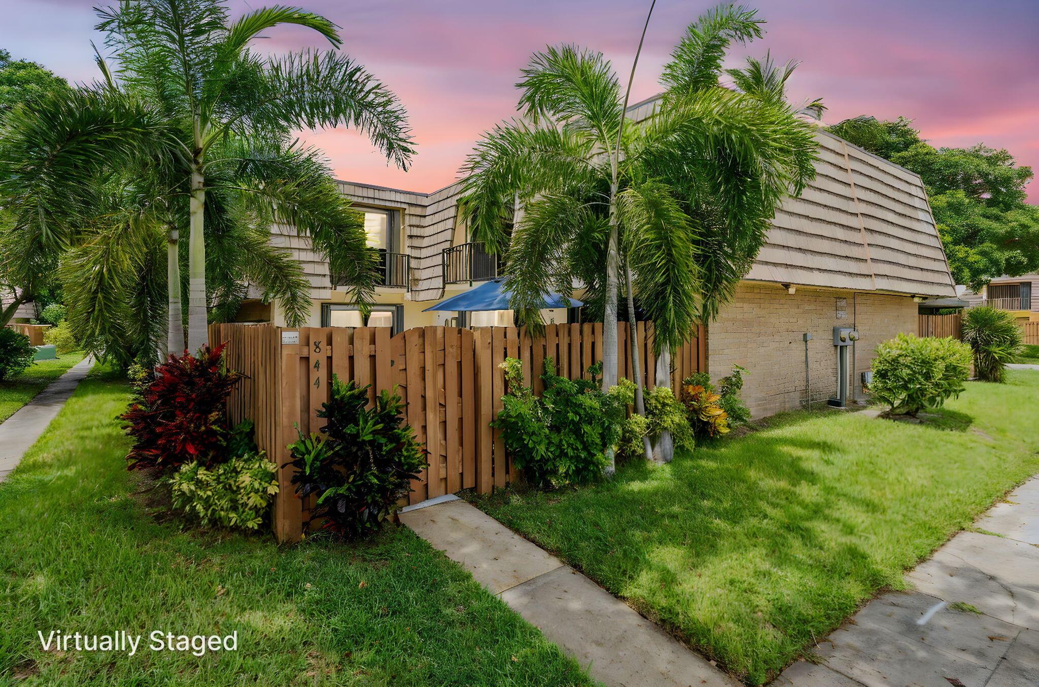 Discover this beautifully maintained 3 bedroom, 2.5 bath townhouse in Palm Springs, offering comfort and updates throughout. The remodeled master bath adds a modern touch, while a newer roof (2022) and A/C (2019) provide peace of mind. The kitchen boasts 2022 appliances, and sliding doors have been tinted for energy efficiency. Enjoy a freshly painted patio floor, accordion shutters for storm protection, and lush landscaping that enhances curb appeal. This home combines style, function, and convenience--ready for you to move right in!