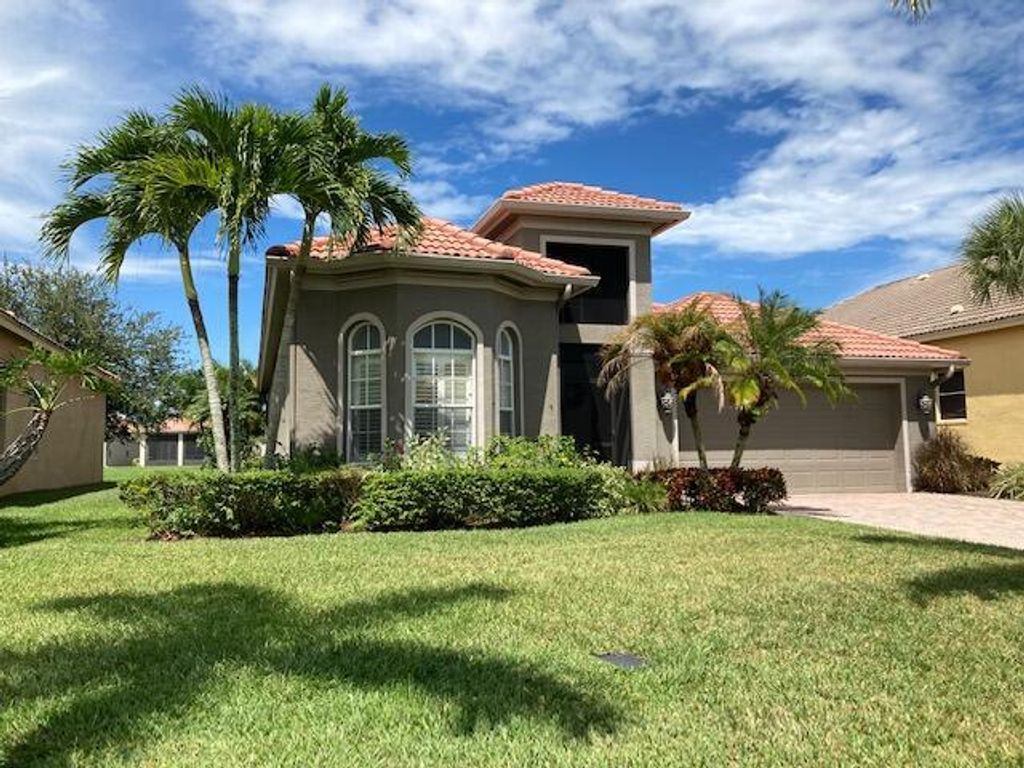 Photo of 351 NW Stratford Lane, Port Saint Lucie, FL 34983 (MLS # R10745442)