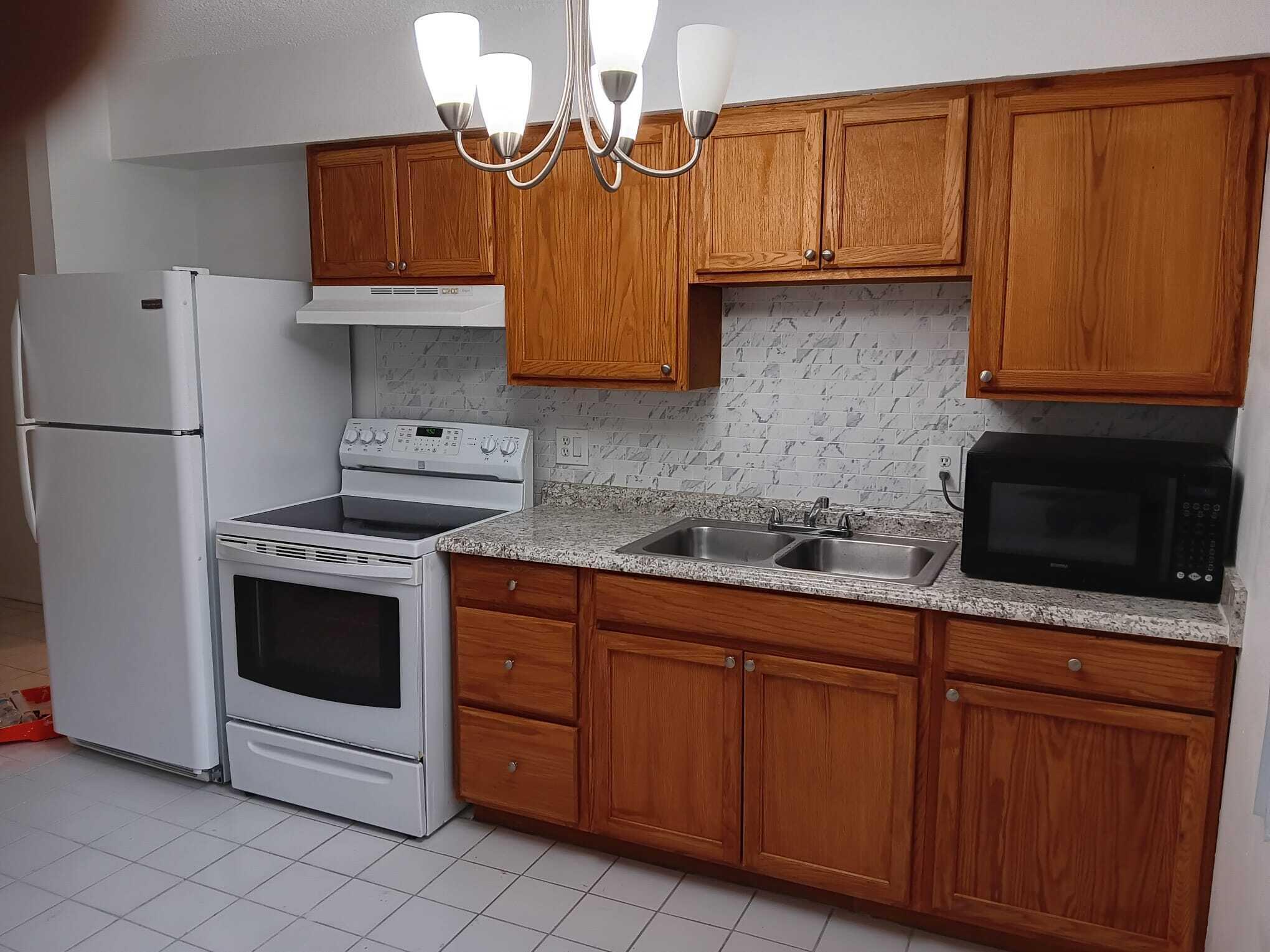 PALM GARDENS CONDO - Residential Lease
