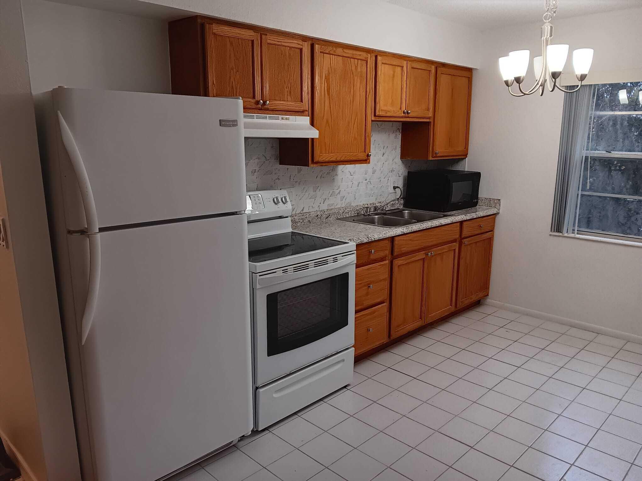 PALM GARDENS CONDO - Residential Lease