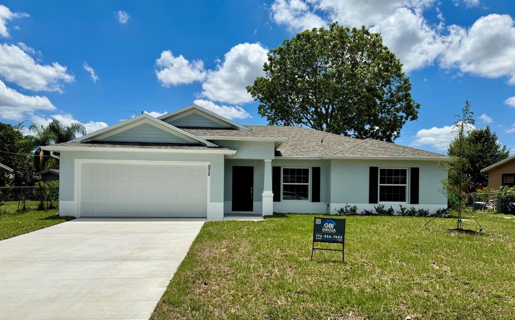 Photo of 532 SW Buswell Avenue, Port Saint Lucie, FL 34983 (MLS # R11092418)