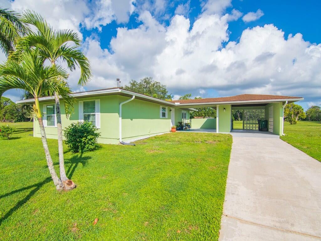 Photo of 315 NE Brasher Court, Port Saint Lucie, FL 34983 (MLS # R11126166)