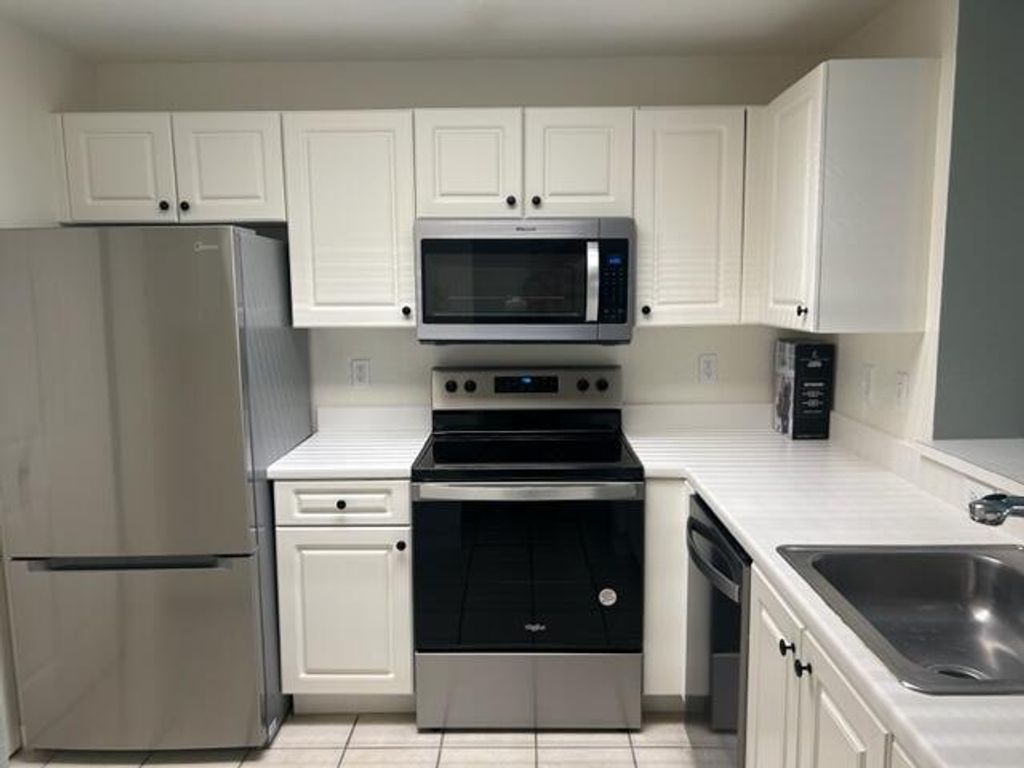 Photo of 2804 Sarento Place #107, Palm Beach Gardens, FL 33410 (MLS # R11010257)