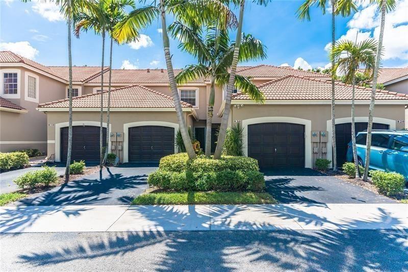 Live in style and comfort in this beautifully renovated townhome in the heart of Weston! Featuring 2 spacious bedrooms, 2.5 modern bathrooms, and a 1-car garage, this home offers upgrades that truly impress. Enjoy a serene screened and tiled patio with peaceful garden views. Inside, you'll find new porcelain floors downstairs, rich hardwood upstairs, and fully remodeled bathrooms with seamless showers and elegant finishes. Custom closets, smooth ceilings, new lighting, high-end fans, HD blinds, and granite countertops with stainless steel appliances make this home move-in ready. Located in a gated community just minutes from major highways and top-rated schools like Cypress Bay, Falcon Cove, and Eagle Pointe Elementary, this one has it all!