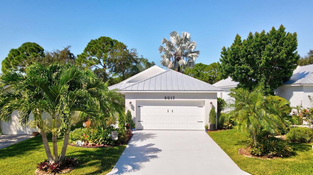 Photo of 8017 SE Sugar Pines Way, Hobe Sound, FL 33455 (MLS # R10929014)