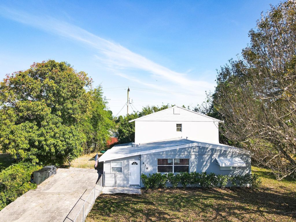 Photo of 416 Cheyenne Drive, Lake Worth, FL 33462 (MLS # R10714116)