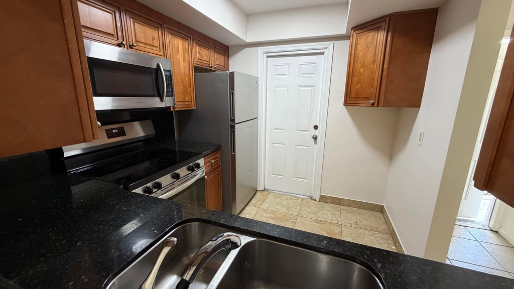 Photo of 4061 NW 9th Avenue #206, Deerfield Beach, FL 33064 (MLS # B26024818)