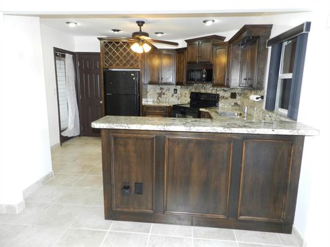 Photo of 3 Greenway Village N Vlg #108, Royal Palm Beach, FL 33411 (MLS # R11143843)