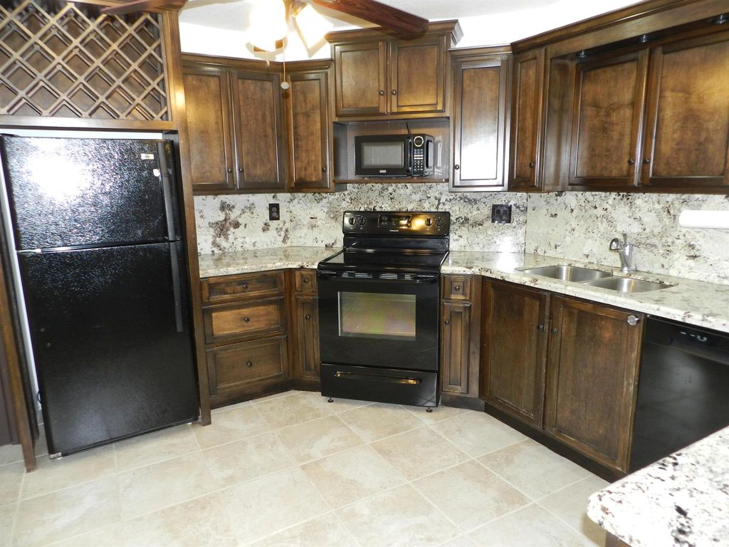 Photo of 3 Greenway Village N Vlg #108, Royal Palm Beach, FL 33411 (MLS # R11143843)