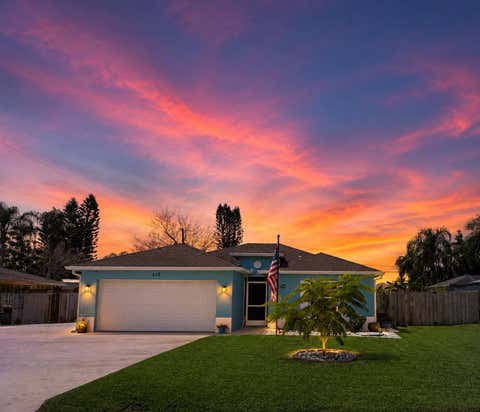 Photo of 510 SW TWIG Avenue, Port Saint Lucie, FL 34983 (MLS # B26064834)