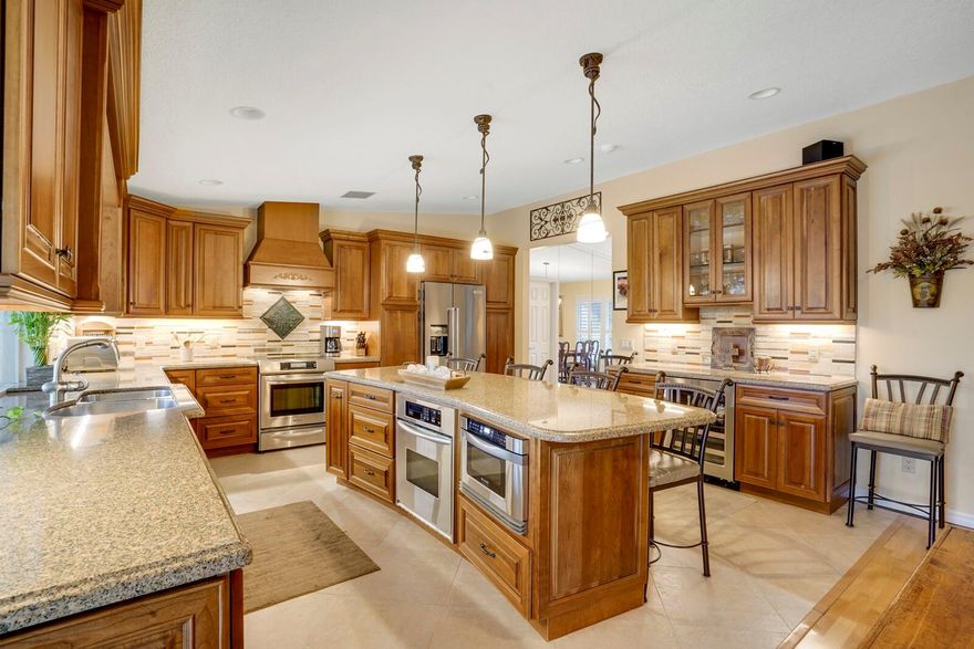 Absolutely stunning well maintained 4 Bedroom 2.5 Bath Pool home in Coral Springs.  Featuring an open layout, large kitchen w/ designer touches throughout, double oven, large island, the kitchen has a water-view and overlooks a large backyard w/ a beautiful pool and garden shed.  Kitchen opens to a large family room complete with a working wood fireplace, perfect layout for entertaining.  Separate formal dining and formal living area with plantation shutters. Split bedroom plan, no carpet in this house.  Updated bathrooms.  Laundry Room w/ storage. Updated Electrical. Hurricane Protection.  Amazing sunsets from the private manicured backyard.  Incredible opportunity to live in beautiful Cypress Glen, no HOA, close to excellent schools, shopping, and highways.  This house is move in ready!