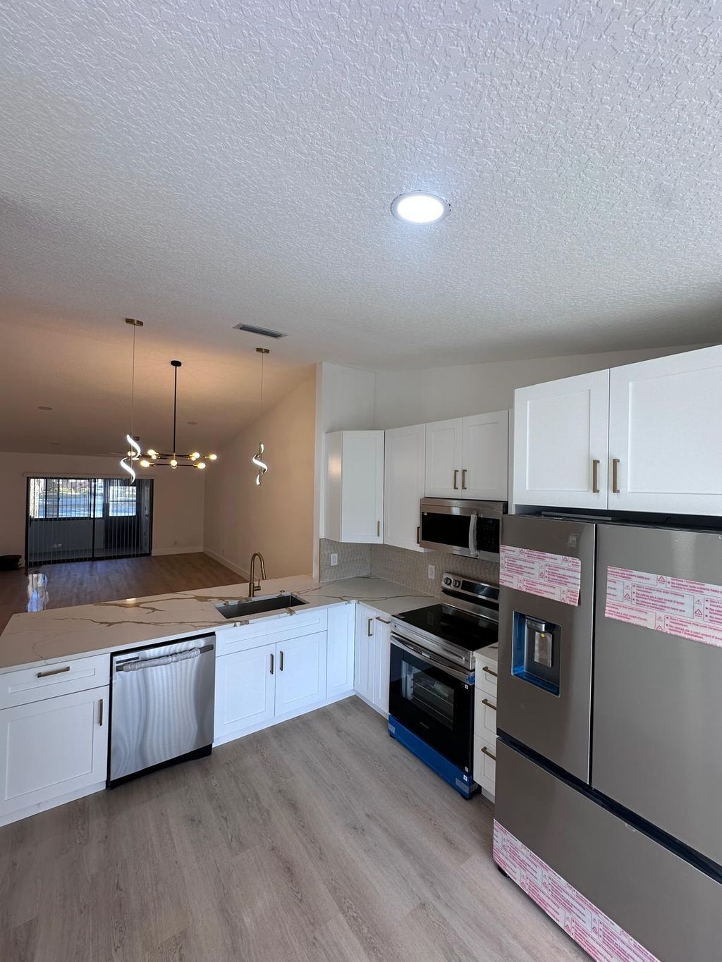 Photo of 544 Shady Pine Way #A, Greenacres, FL 33415 (MLS # R11167072)