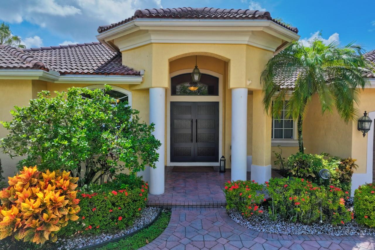 FIrst Day on the Market! Waterfront Beauty with 4 Bedrooms / 3.5 Baths and spacious Office/Den. Triple Split Bedroom Plan, Volume Ceilings, Great Layout! Neutral Floors, Designer Window Treatments. XLarge Family Room, Breakfast Area and Kitchen w/ open Layout, Updated Beautiful Bathrooms w/ Porcelanosa Tile and Top Quality Finishes..Formal Living and Dining Room. Lots of Picture Windows.. Paver Pool Patio w/Large Fence Pool on Canal leading to the Amazing (boating allowed) Lake Coral Springs.. Fabulous home... Don't Miss It!