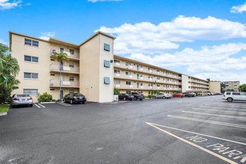 Photo of 2615 NE 3rd Court #308, Boynton Beach, FL 33435 (MLS # B26054436)