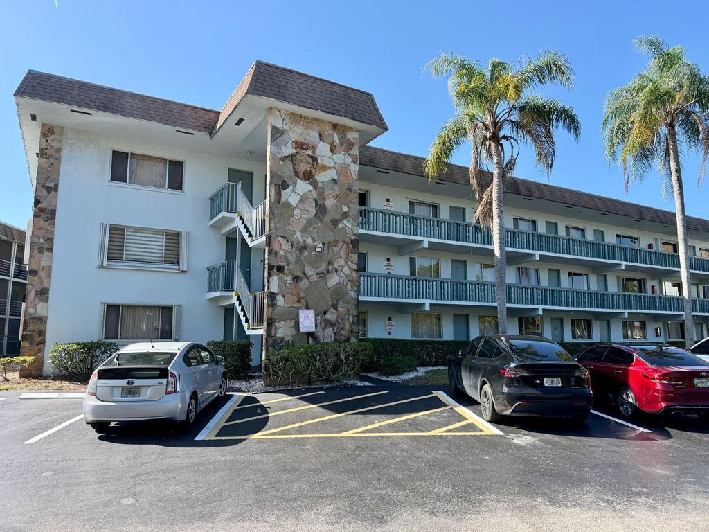 Photo of 2000 Springdale Boulevard #102, Palm Springs, FL 33461 (MLS # B26005333)