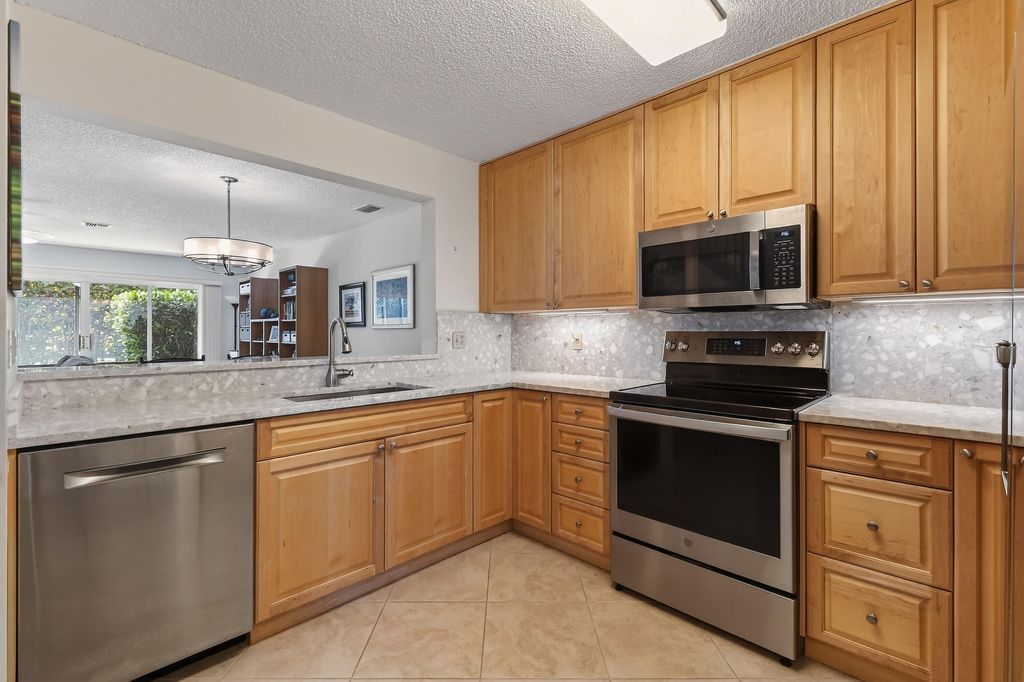 Photo of 818 Ocean Dunes Circle, Jupiter, FL 33477 (MLS # R11156136)