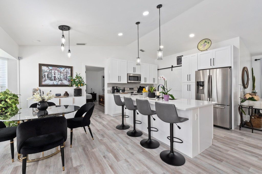 Photo of 5789 NW Belwood Circle, Port Saint Lucie, FL 34986 (MLS # R11089841)