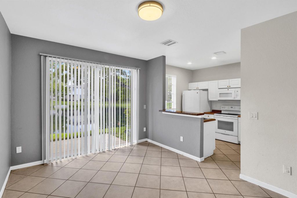 Photo of 991 Abaco Lane, Riviera Beach, FL 33404 (MLS # R11125270)