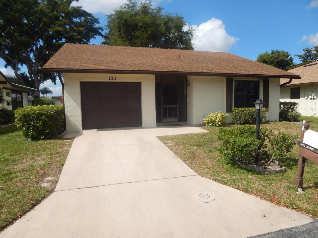 Photo of 6229 Lakemont Circle, Greenacres, FL 33463 (MLS # R11165725)