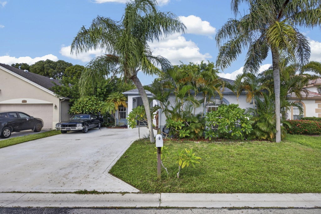 Photo of 1480 Lake Breeze Drive, Wellington, FL 33414 (MLS # B26063233)
