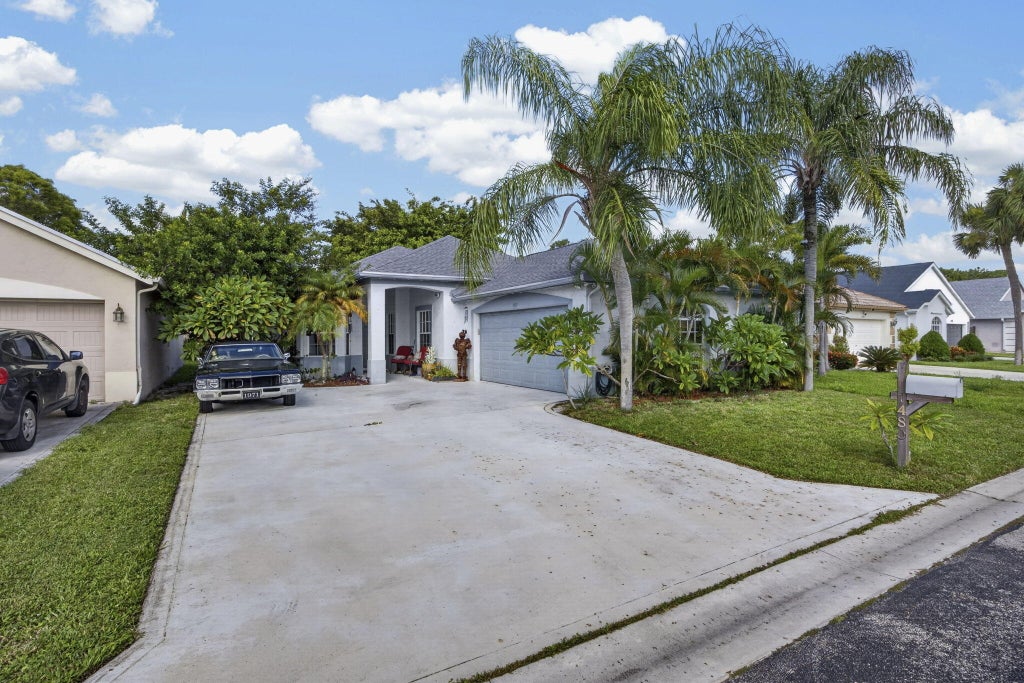 Photo of 1480 Lake Breeze Drive, Wellington, FL 33414 (MLS # B26063233)
