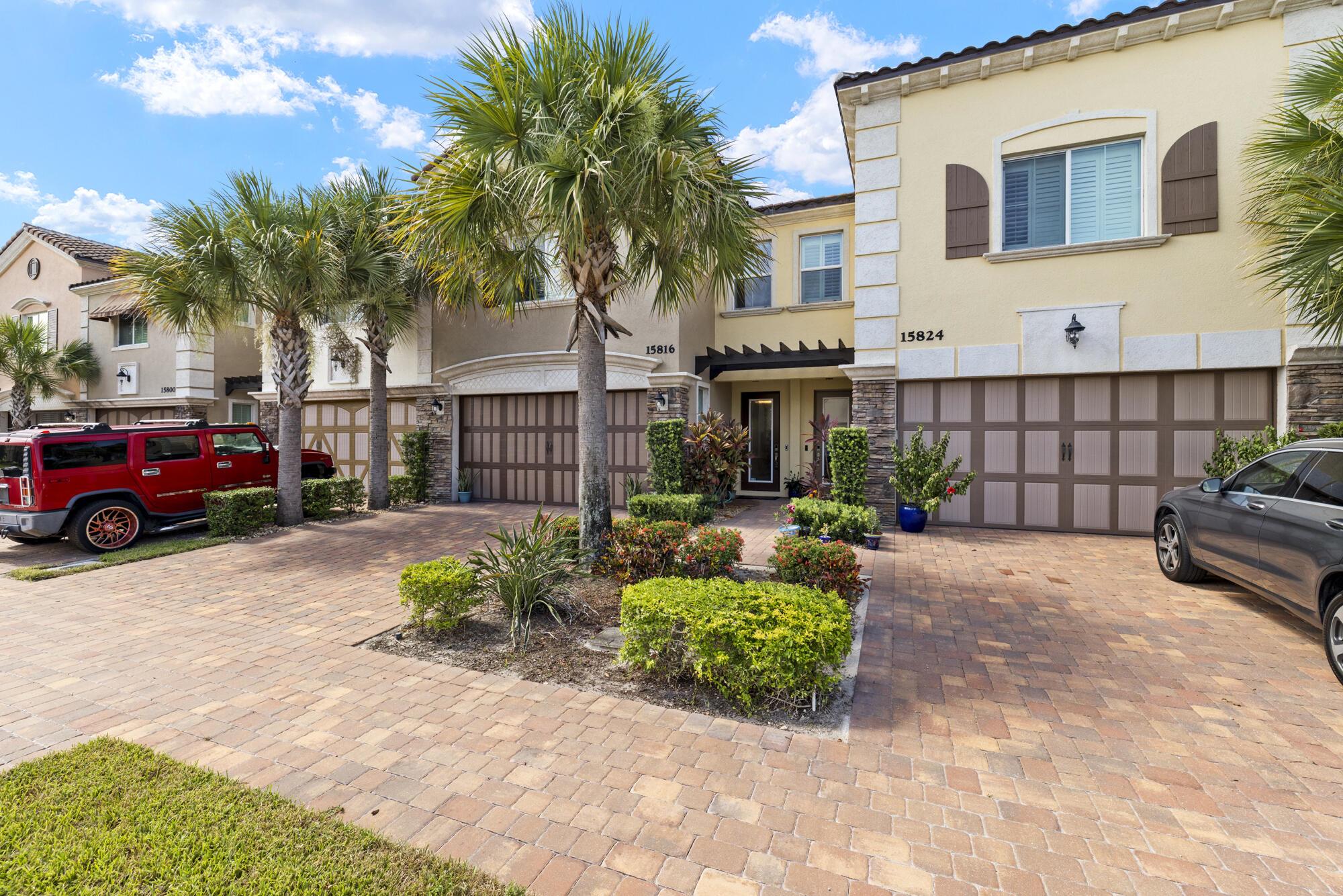 Stunning 3 bedroom townhome in gated Binks Pointe that overlooks the 4th hole of Wellington National Golf and preserve. Features impact windows and doors thru out, screened patio and fenced yard. Spacious kitchen with white cabinets and quartz counter tops plus bonus wine and coffee station with extra cabinets and storage and breakfast bar. Formal dining area and half bath downstairs. Huge master bedroom with massive walk in closet, primary bath with oversized walk in shower and double sinks, upstairs laundry room with extra cabinets and counter space plus upstairs work area/loft. The community features pool, gym and clubhouse.