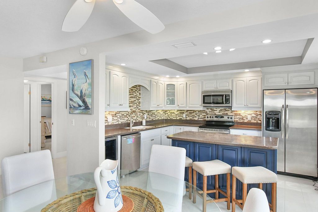 Photo of 460 Brackenwood Lane S, Palm Beach Gardens, FL 33418 (MLS # R11033092)